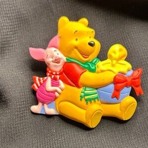 VTG Cute Plastic Winnie the Pooh and Piglet Holiday pin.